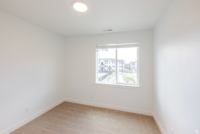 4695 South 690th West, Unit U201 Mapleton, UT 84664 - Photo 5 of 16 Neutral-toned carpet flooring