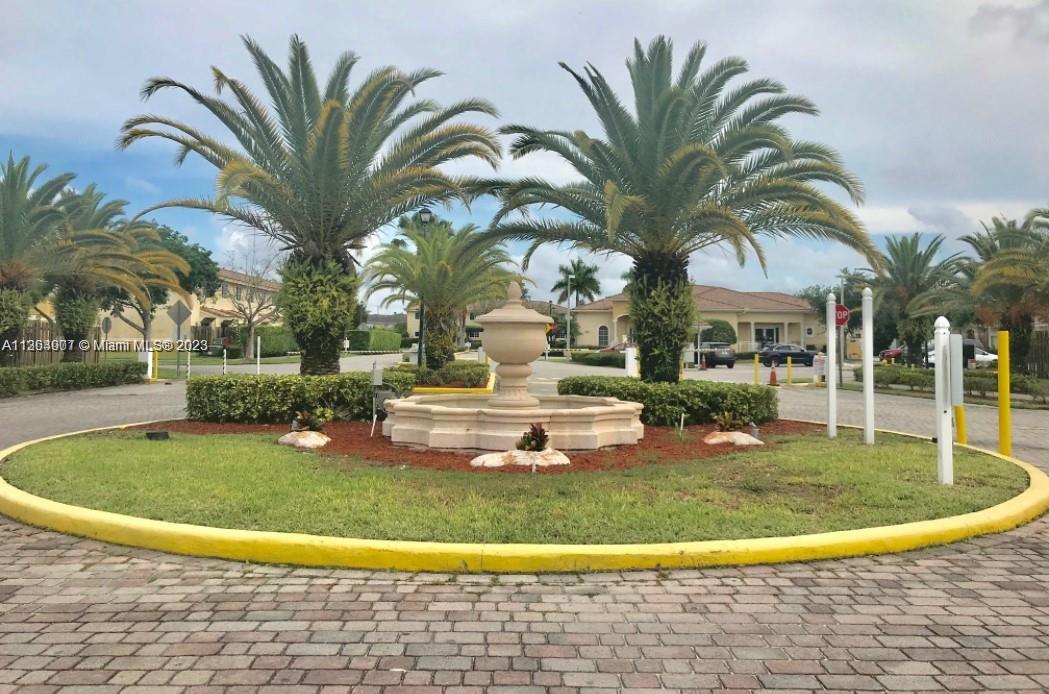 a view of a swimming pool with a garden