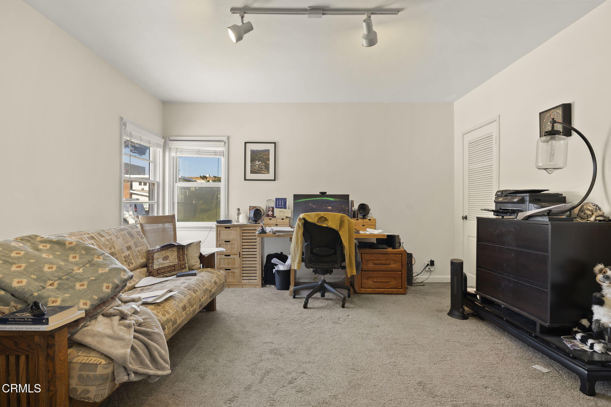 3025 Ocean Drive Oxnard, CA 93035 - Photo 19 of 50 a bedroom with furniture and a window