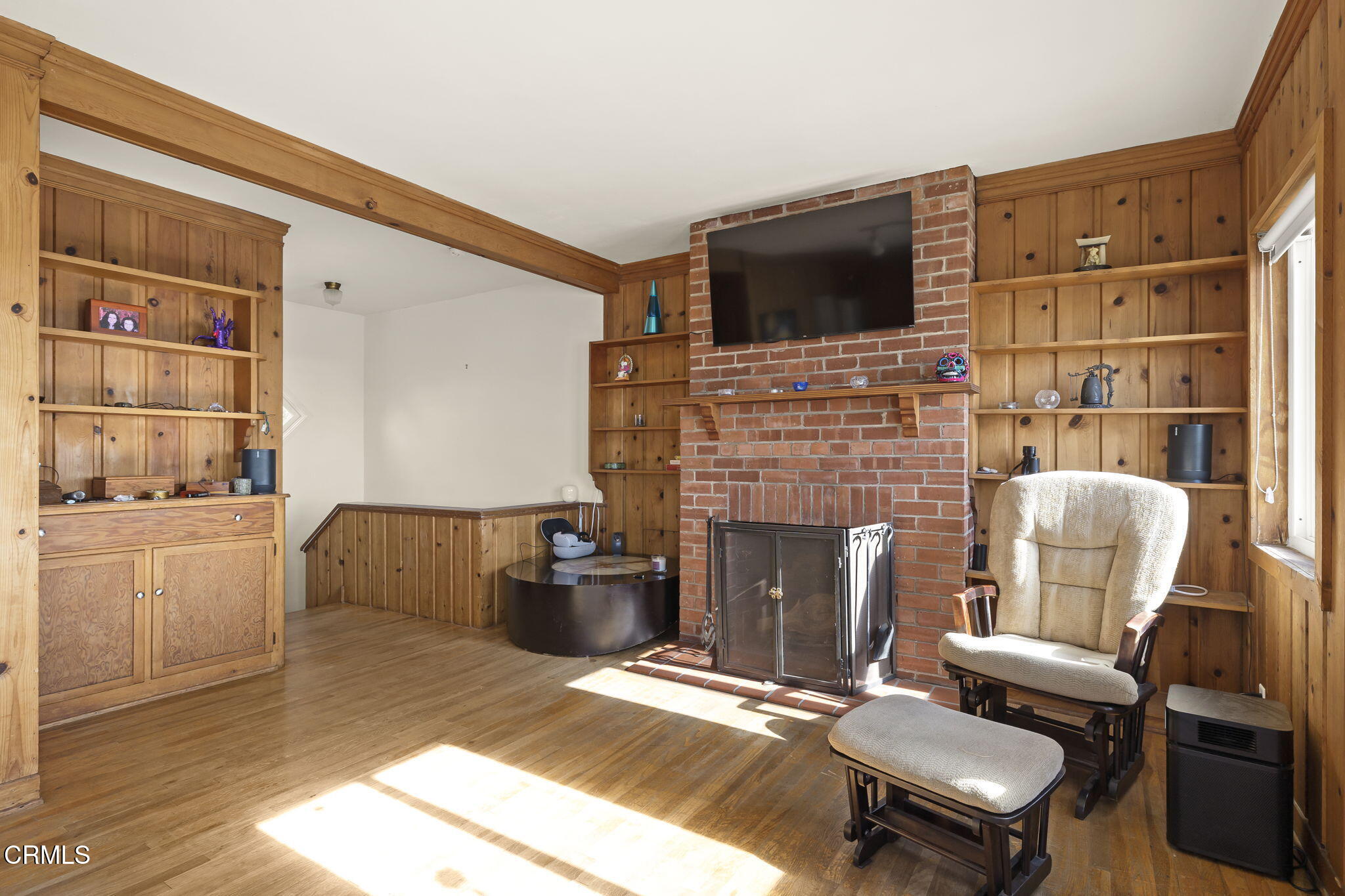 3025 Ocean Drive Oxnard, CA 93035 - Photo 25 of 50 a living room with furniture fireplace and flat screen tv