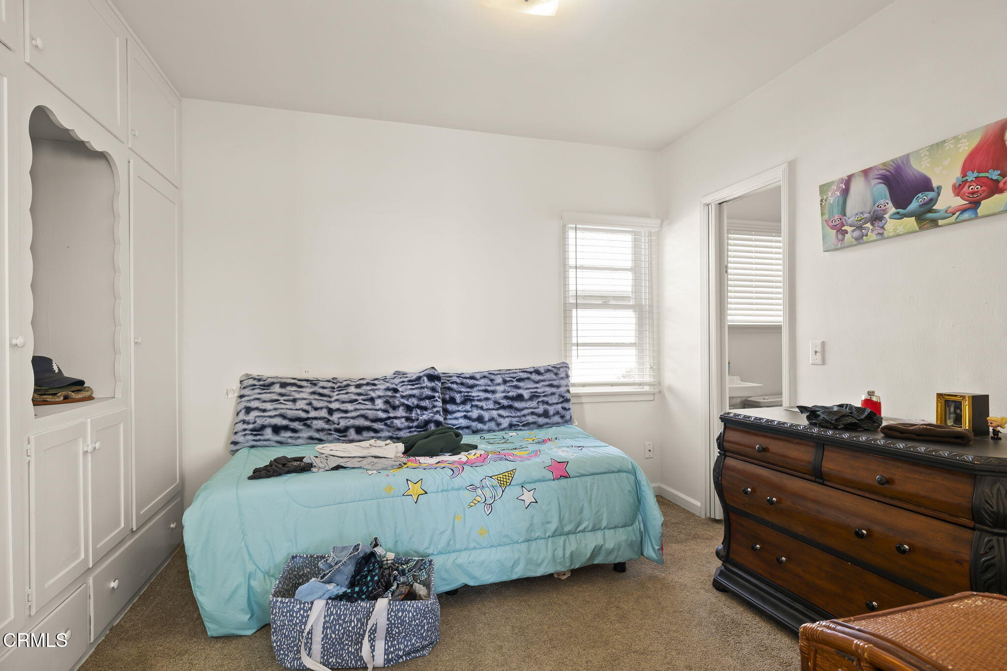 3025 Ocean Drive Oxnard, CA 93035 - Photo 26 of 50 a bedroom with a bed and window