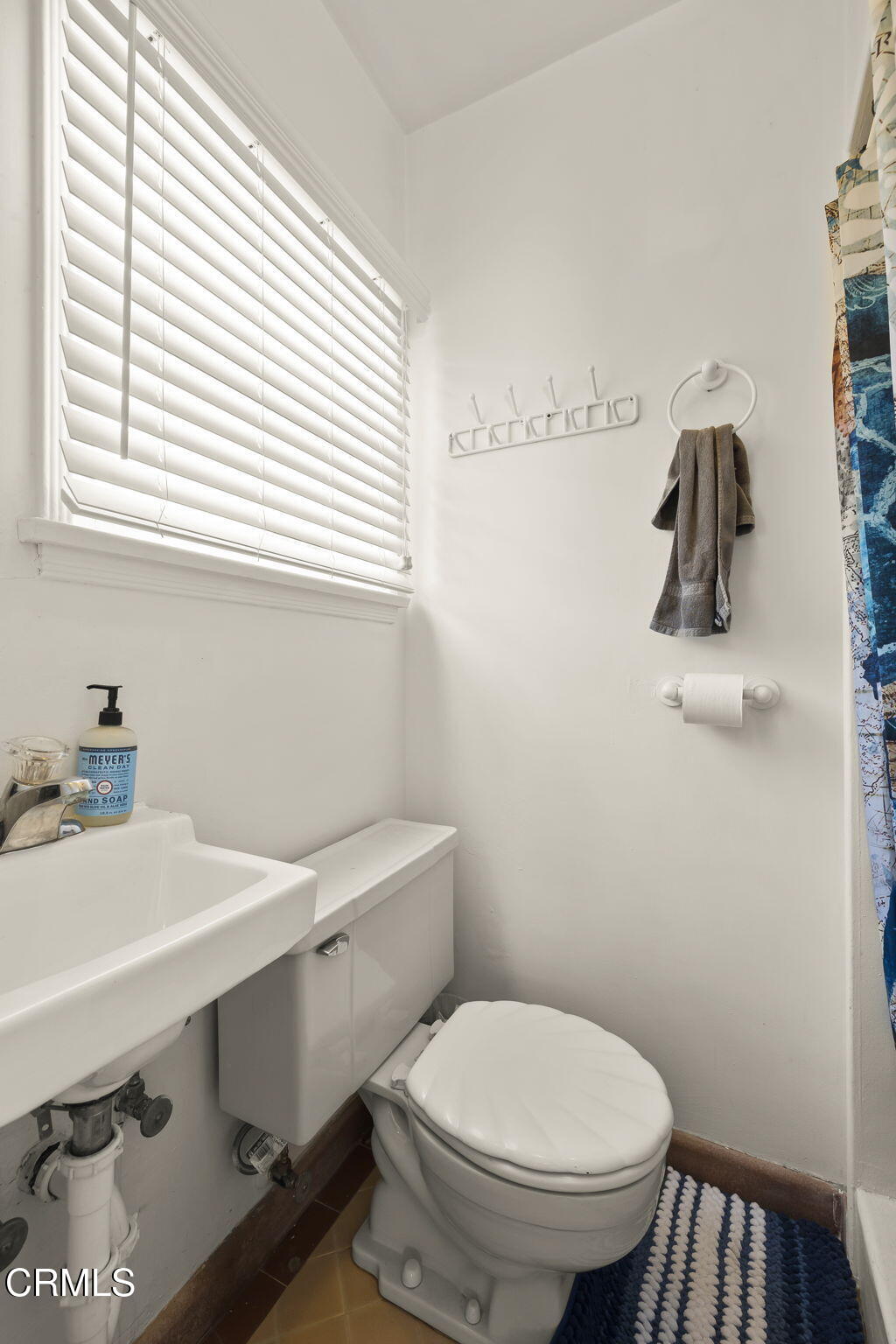 3025 Ocean Drive Oxnard, CA 93035 - Photo 28 of 50 a bathroom with a sink and a toilet