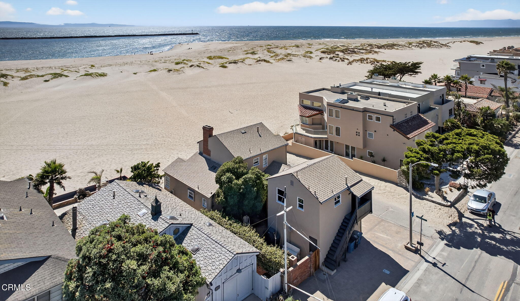 3025 Ocean Drive Oxnard, CA 93035 - Photo 45 of 50 an aerial view of multiple houses with outdoor space