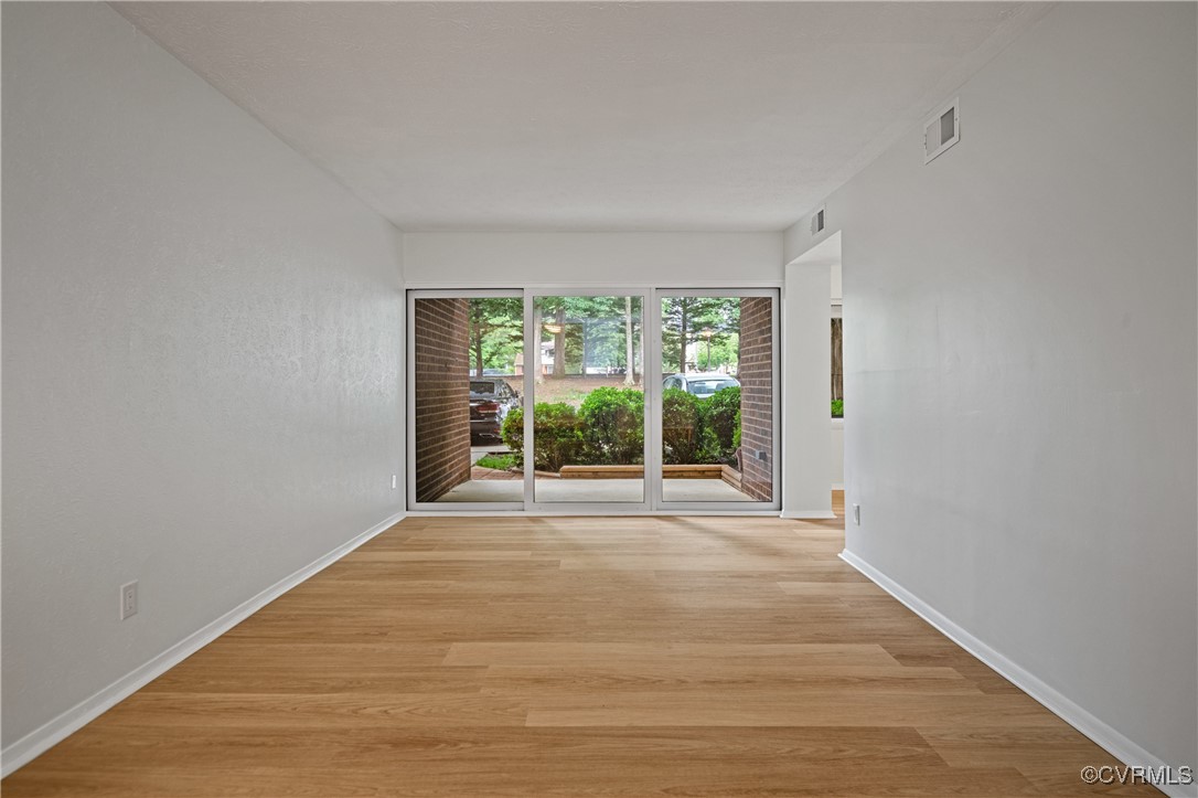 1503 Largo Road, Unit T3 Henrico, VA 23238 - Photo 2 of 33 Unfurnished room with baseboards and light wood-st