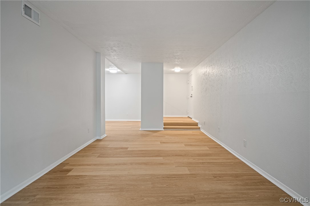 1503 Largo Road, Unit T3 Henrico, VA 23238 - Photo 3 of 33 Hall featuring light wood-style floors and baseboa