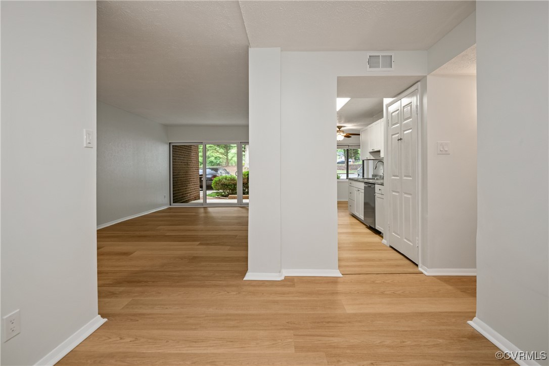 1503 Largo Road, Unit T3 Henrico, VA 23238 - Photo 7 of 33 Hallway with baseboards, light wood-type flooring,