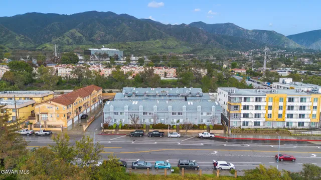 a view of city with tall buildings