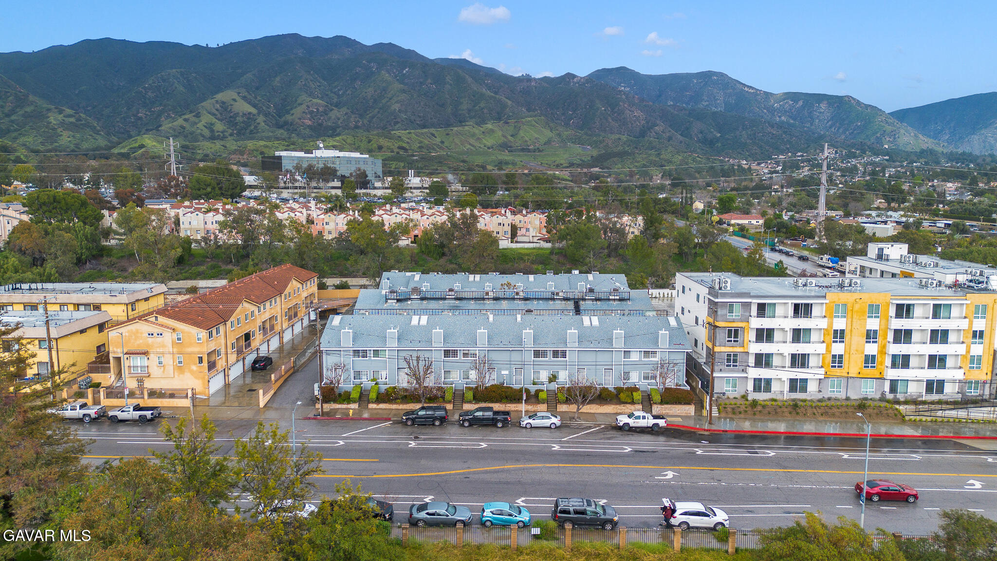 14425 Foothill Boulevard, Unit 17 Sylmar, CA 91342 - Photo 1 of 27 a view of city with tall buildings