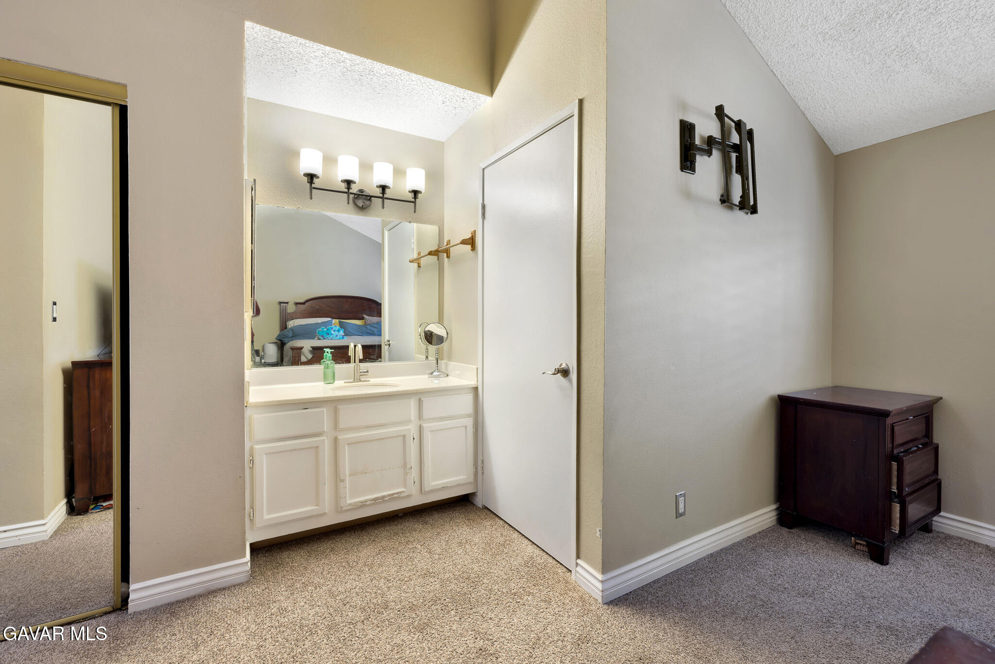 14425 Foothill Boulevard, Unit 17 Sylmar, CA 91342 - Photo 15 of 27 a spacious bathroom with a double vanity sink and mirror
