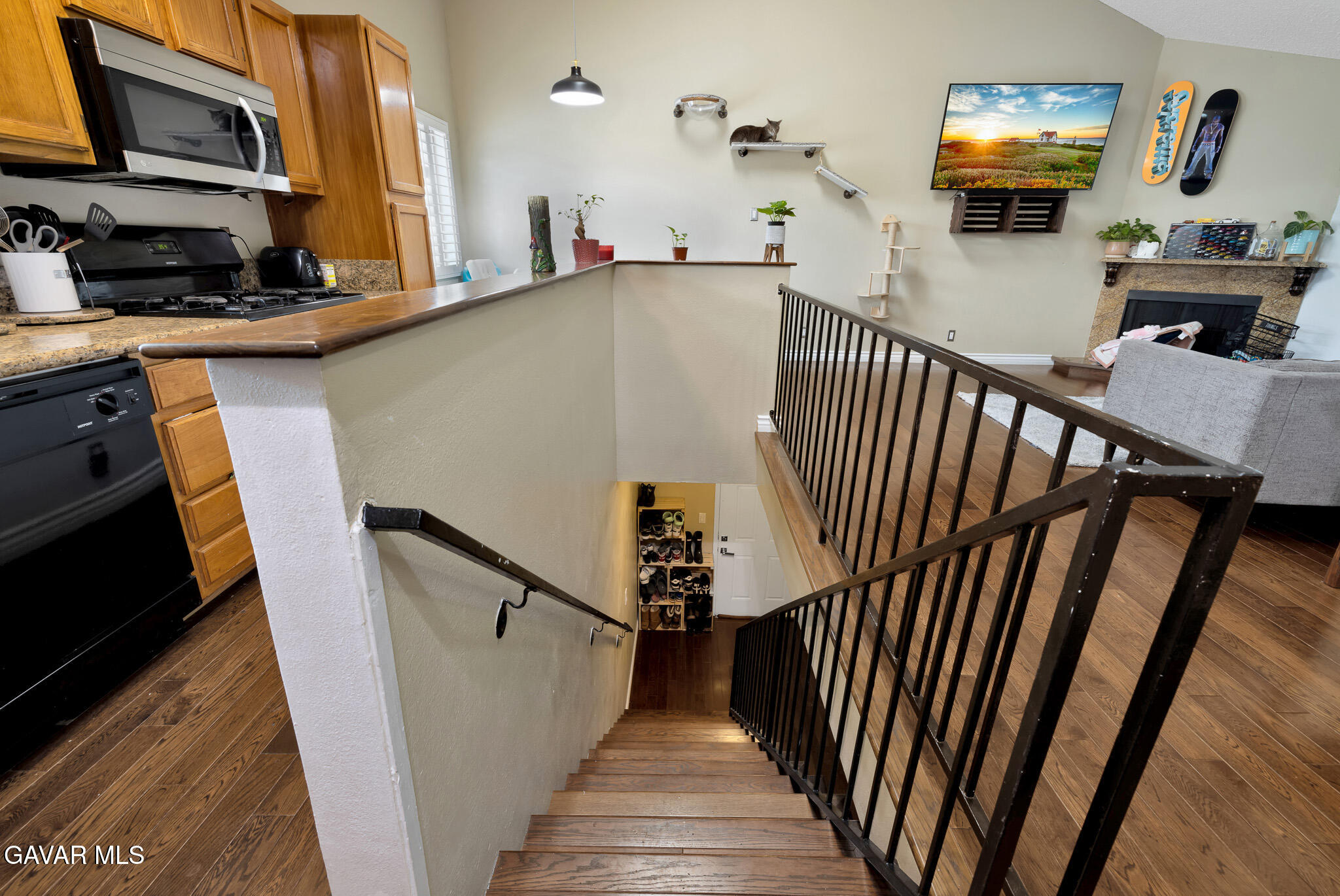 14425 Foothill Boulevard, Unit 17 Sylmar, CA 91342 - Photo 17 of 27 a view of a livingroom with furniture and staircase