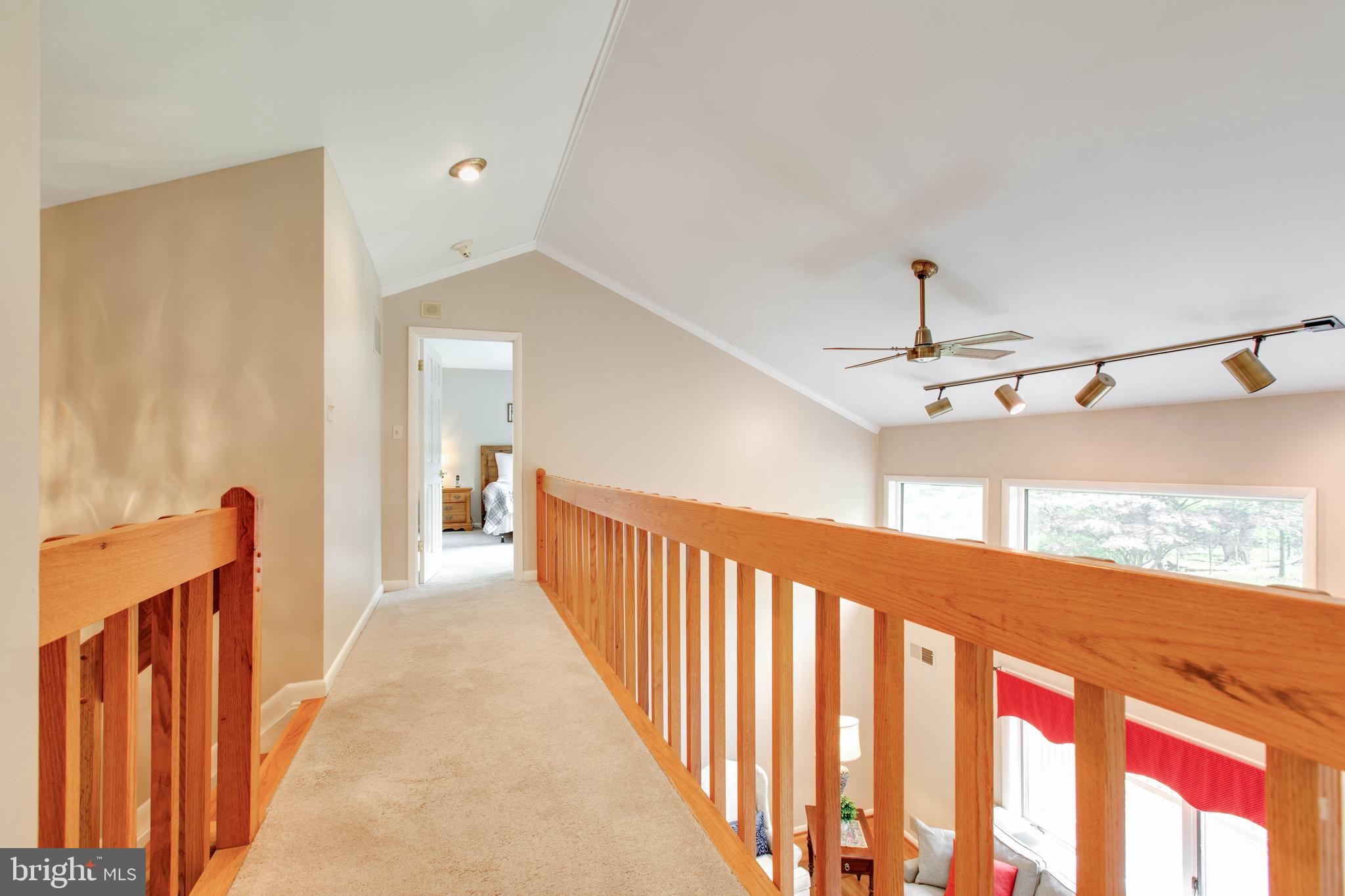 5519 Woodbine Road Sykesville, MD 21784 - Photo 23 of 69 a view of a hallway with a window