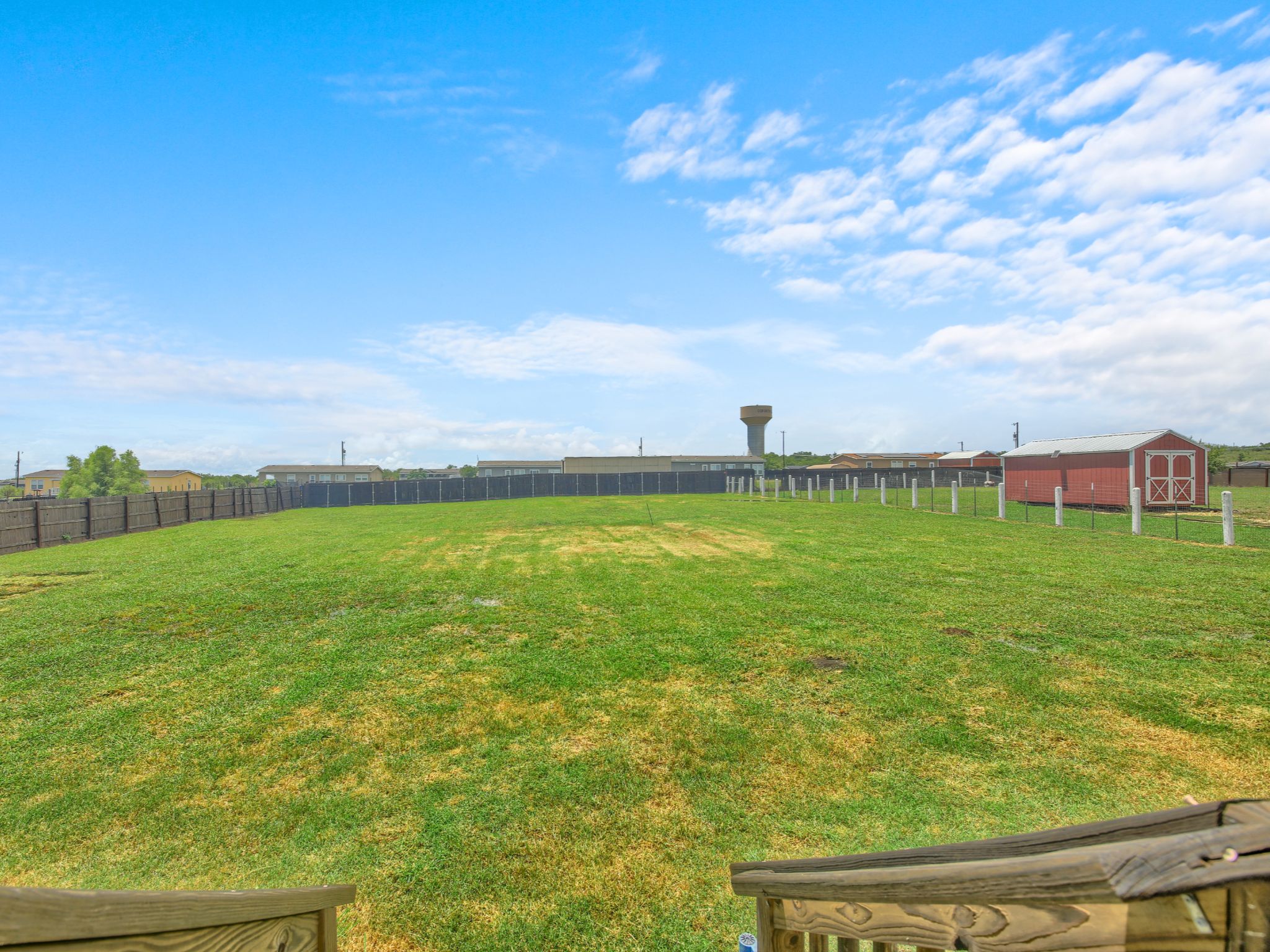 271 Alma Lane Kyle, TX 78640 - Photo 23 of 25 a view of yard with swimming pool and green space