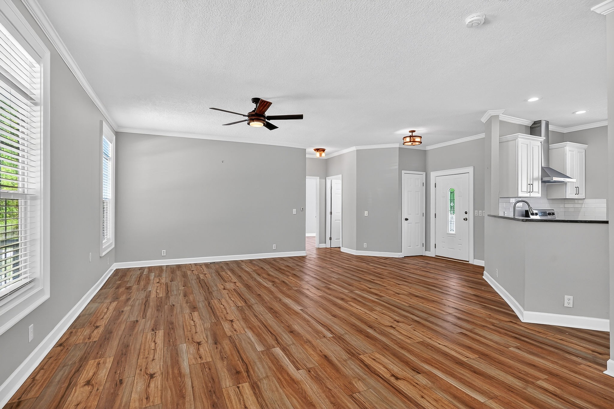 16062 Buffalo Valley Road Silver Point, TN 38582 - Photo 7 of 27 a view of empty room with wooden floor and fan