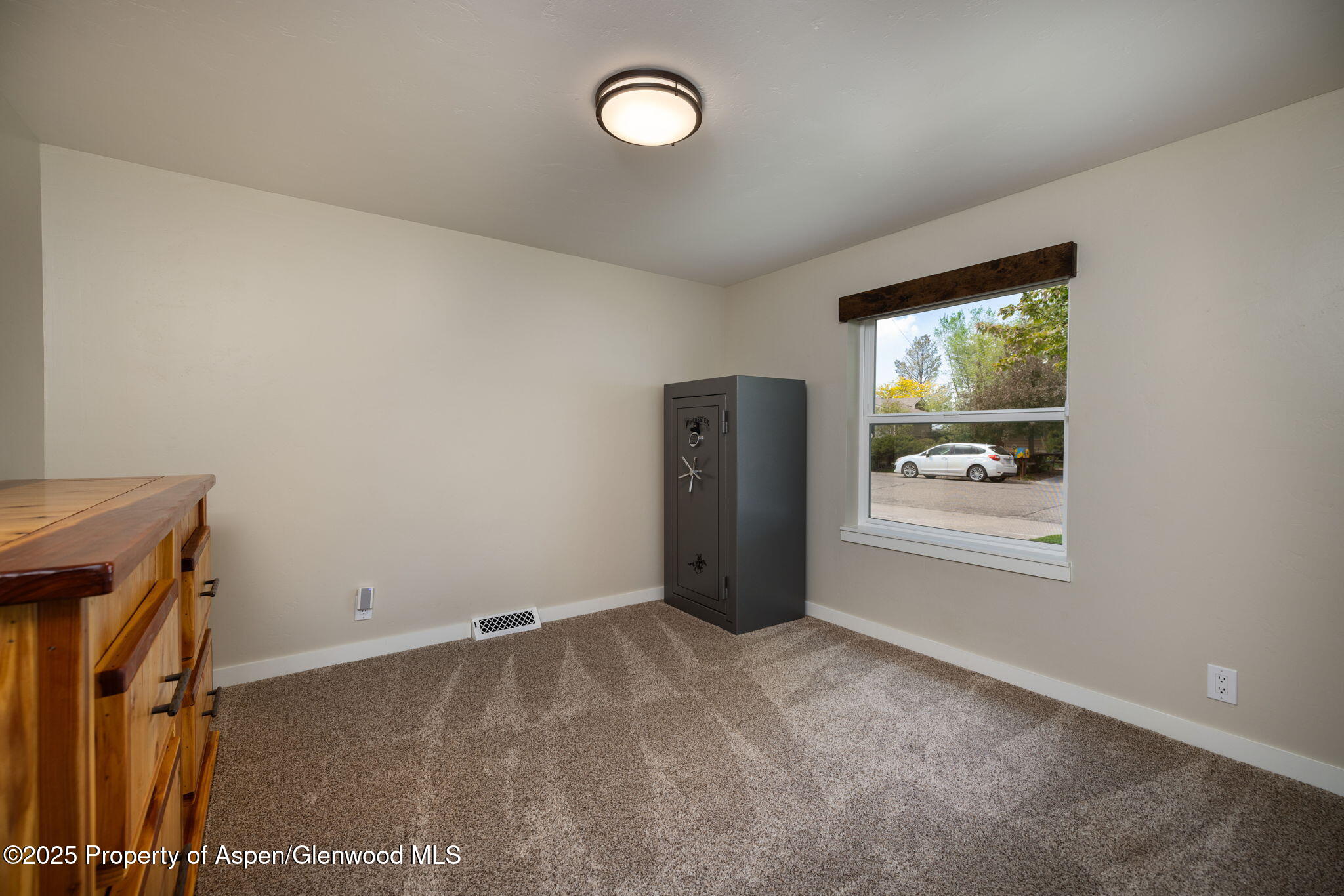 330 Will Avenue Rifle, CO 81650 - Photo 16 of 27 a view of an empty room and window