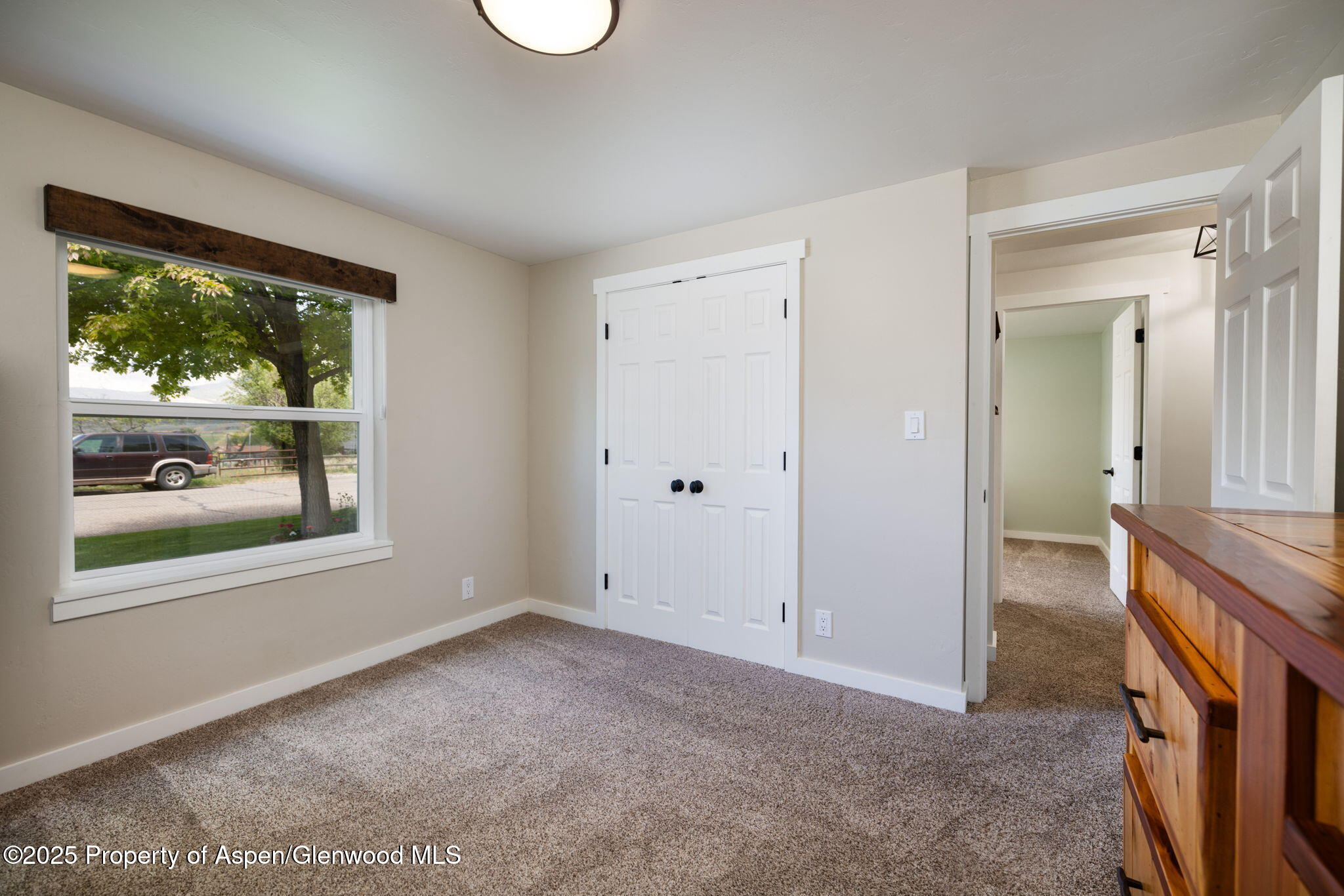 330 Will Avenue Rifle, CO 81650 - Photo 17 of 27 a view of livingroom with furniture and front door