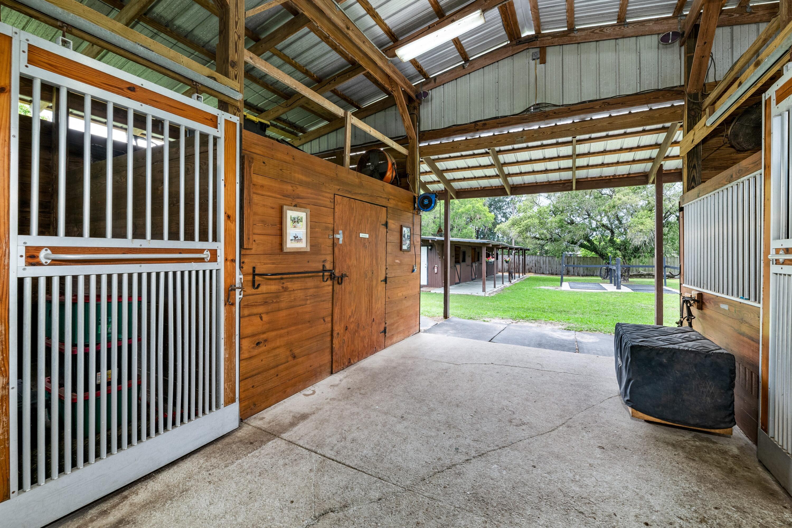 14536 N Road Loxahatchee Groves, FL 33470 - Photo 18 of 79 Center Aisle 7 Stall Barn