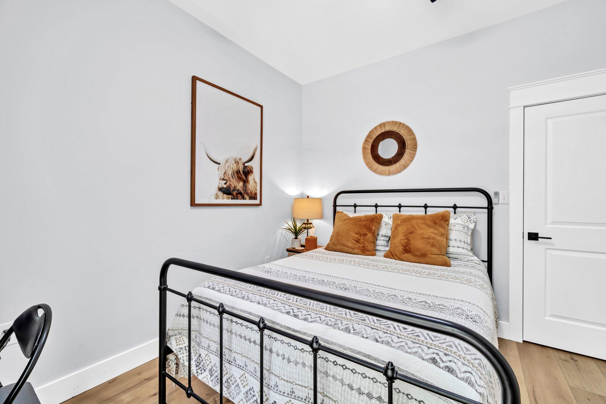 52 Lazy Bone St Point Vernon, FL 32462 - Photo 14 of 62 a bedroom with a bed and a table in it