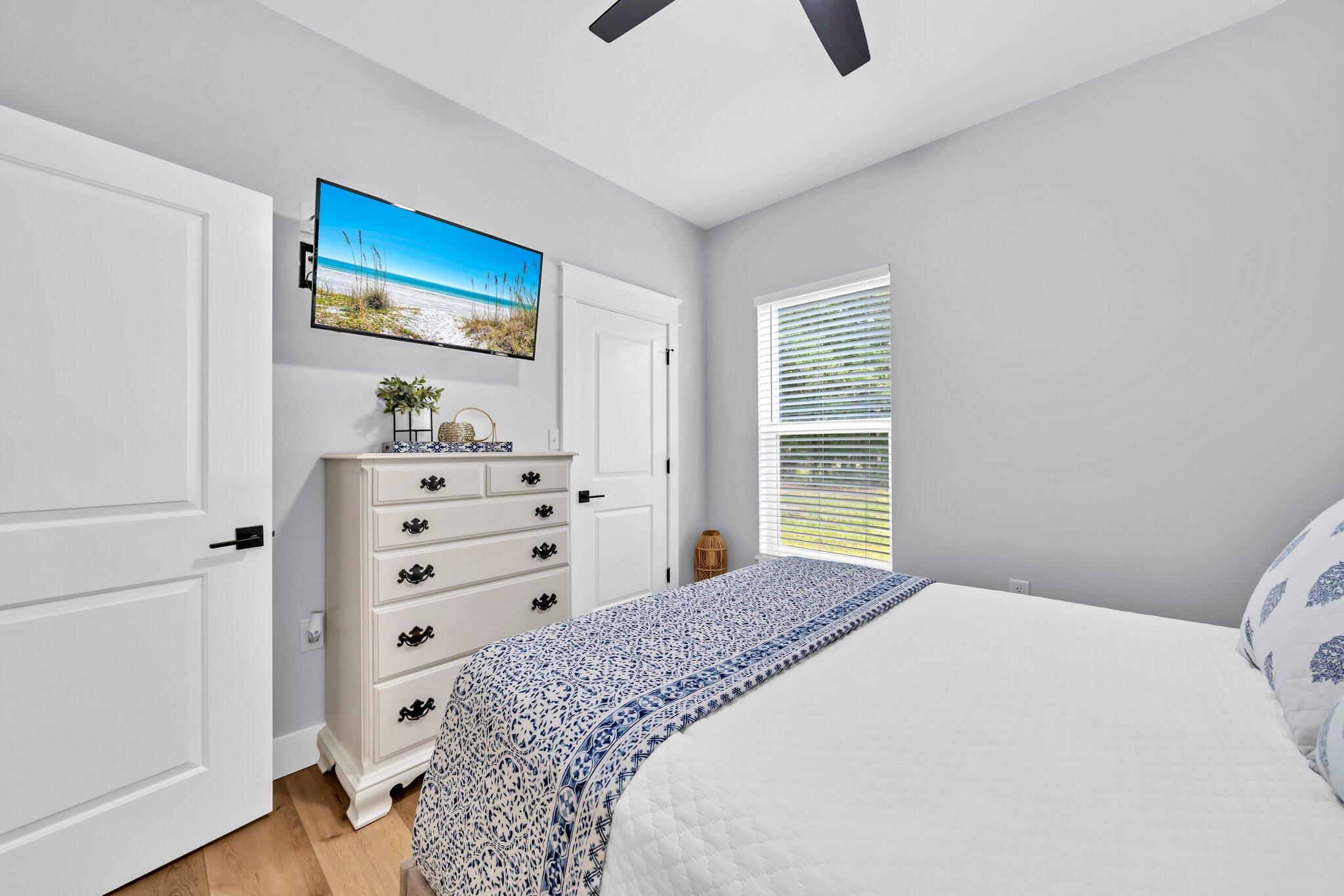 52 Lazy Bone St Point Vernon, FL 32462 - Photo 21 of 62 a bedroom with a bed and a window