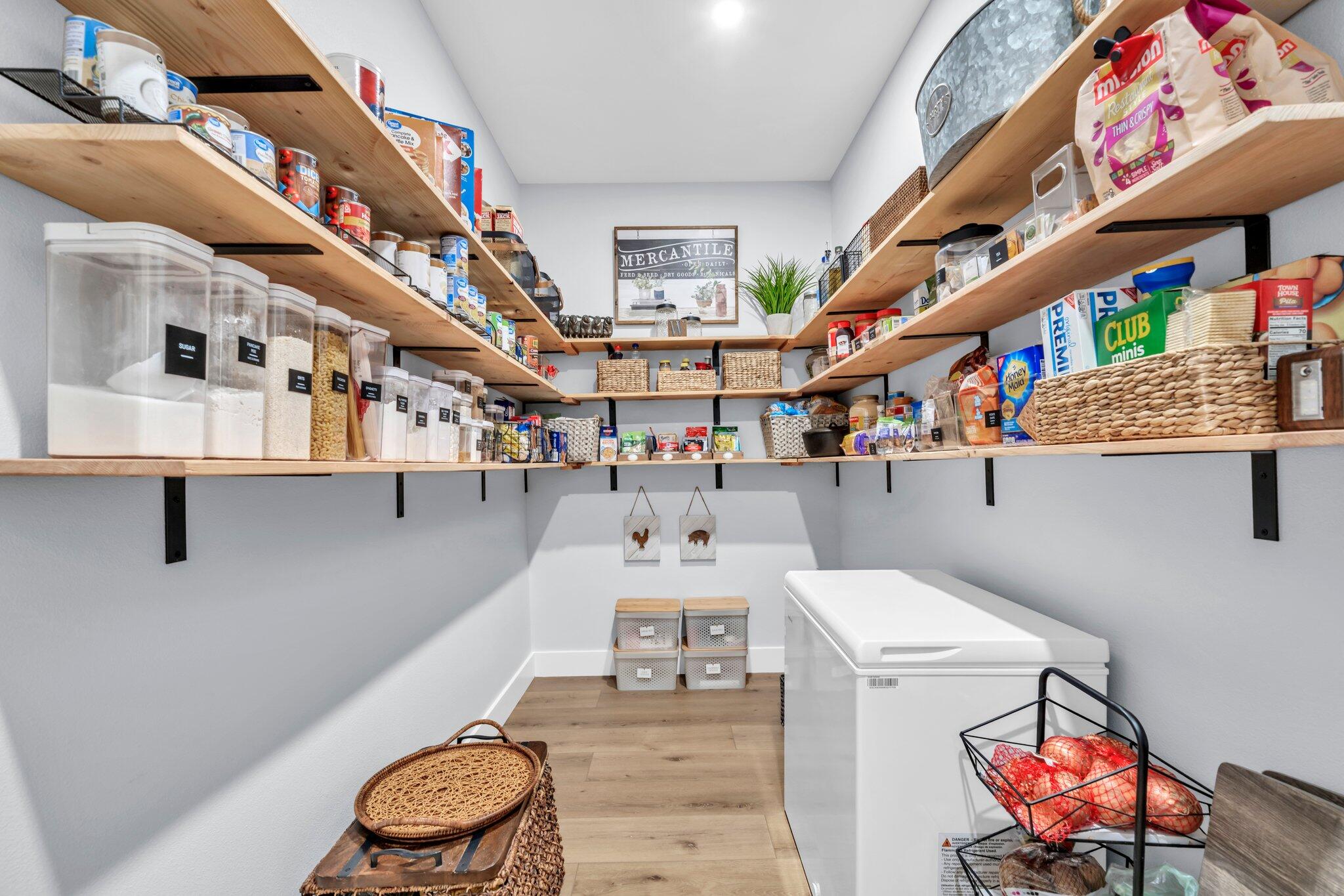 52 Lazy Bone St Point Vernon, FL 32462 - Photo 25 of 62 a living room with furniture and a book shelf
