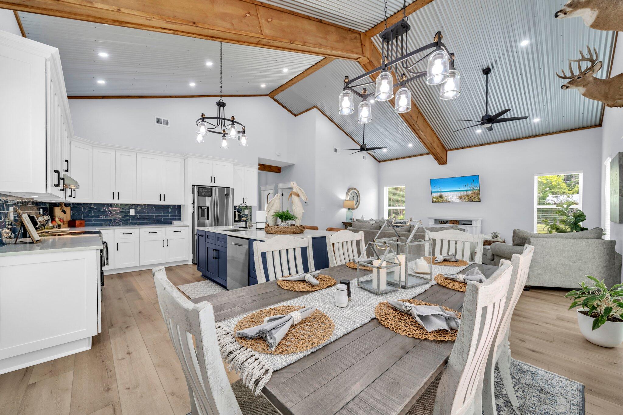 52 Lazy Bone St Point Vernon, FL 32462 - Photo 31 of 62 a living room with lots of furniture and kitchen view