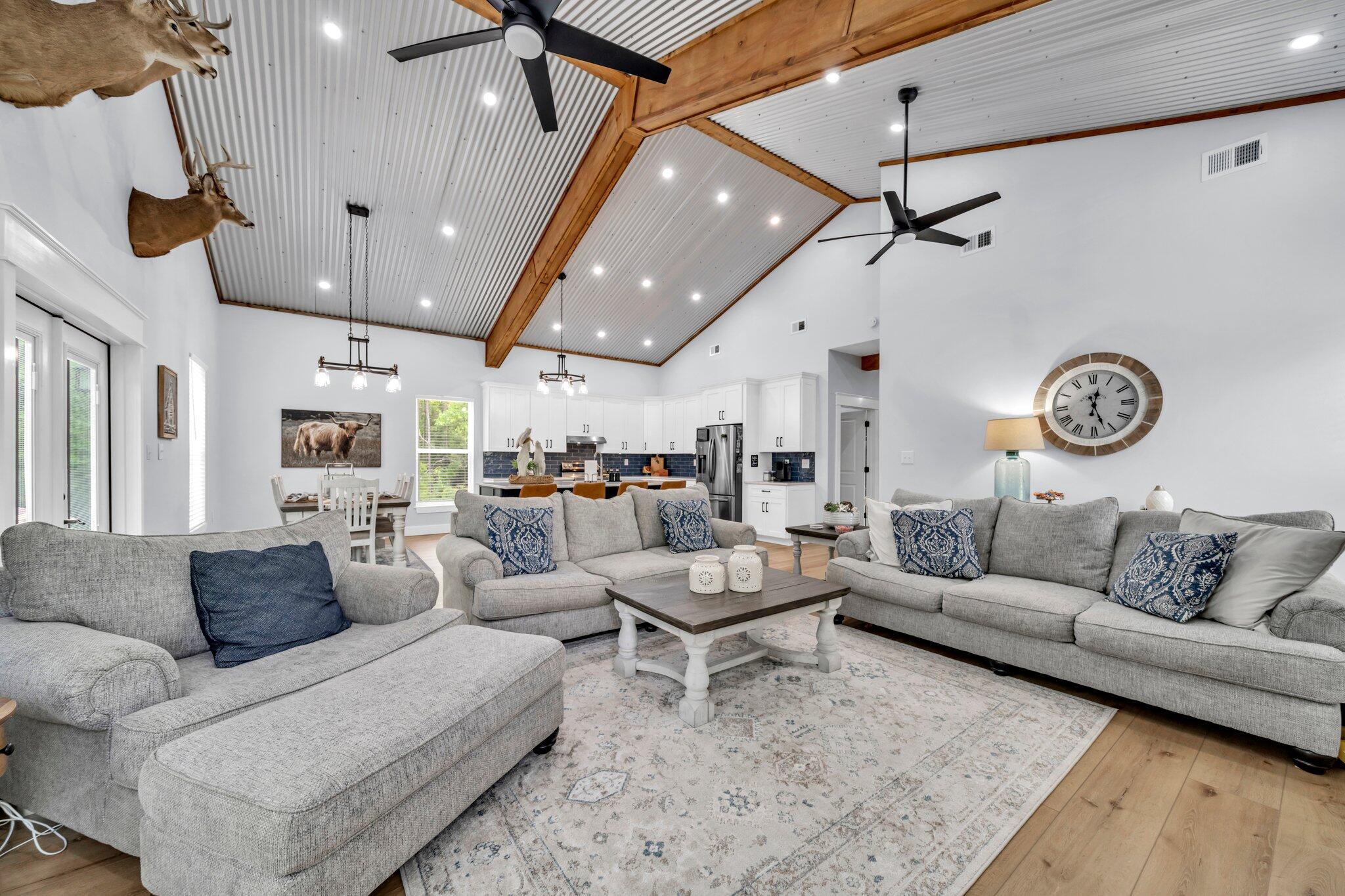 52 Lazy Bone St Point Vernon, FL 32462 - Photo 4 of 62 a living room with furniture and a large window