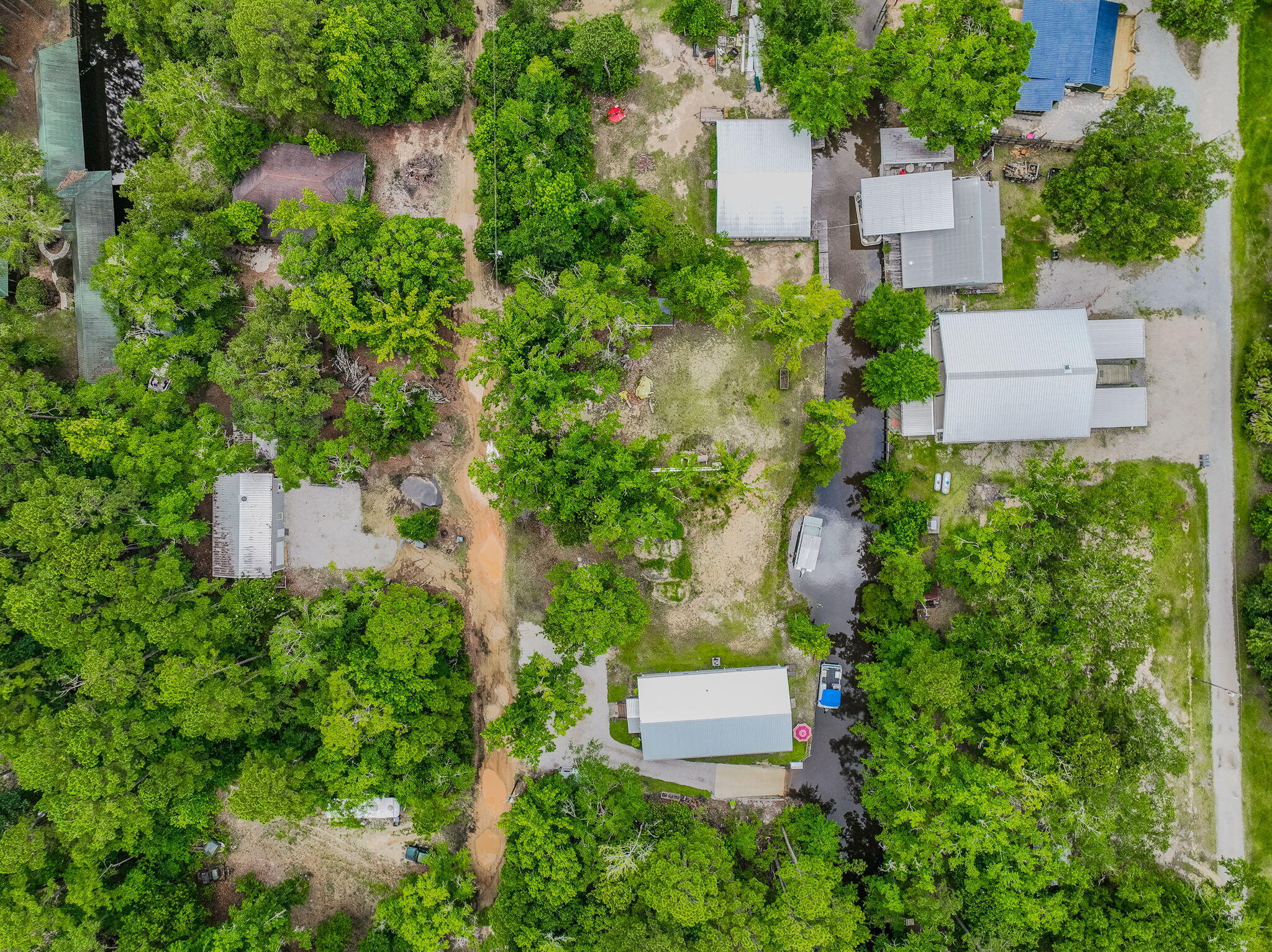 52 Lazy Bone St Point Vernon, FL 32462 - Photo 54 of 62 an aerial view of a house with outdoor space and street view