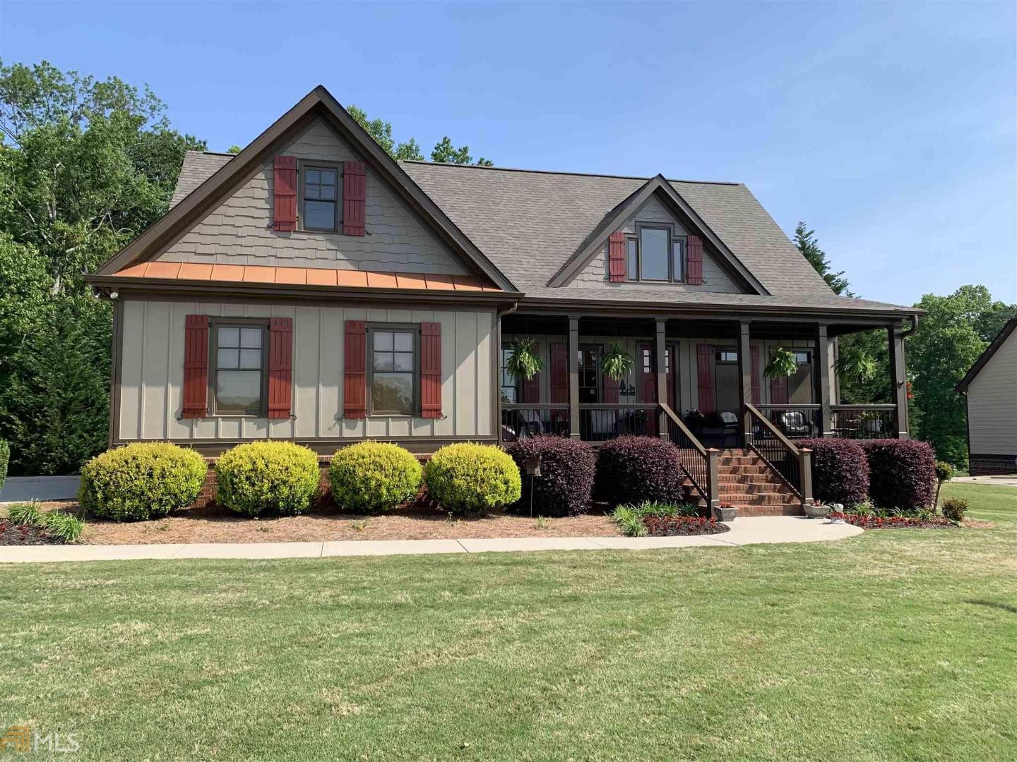 8538 Belton Bridge Road Lula, GA 30554 - Photo 1 of 1 a front view of a house with a yard