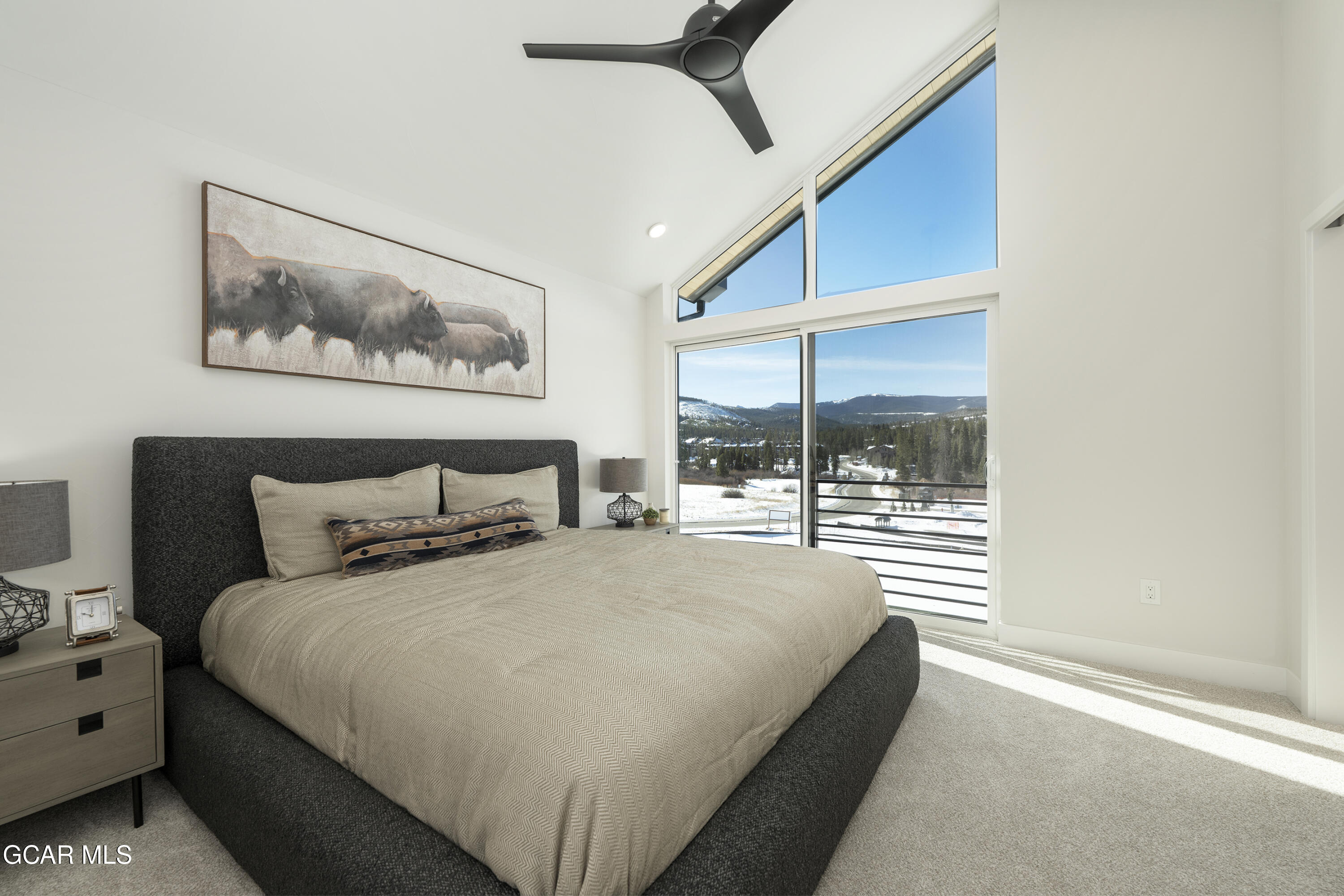 30 Wheeler Road Winter Park, CO 80482 - Photo 23 of 42 a bedroom with a bed and a painting on the wall
