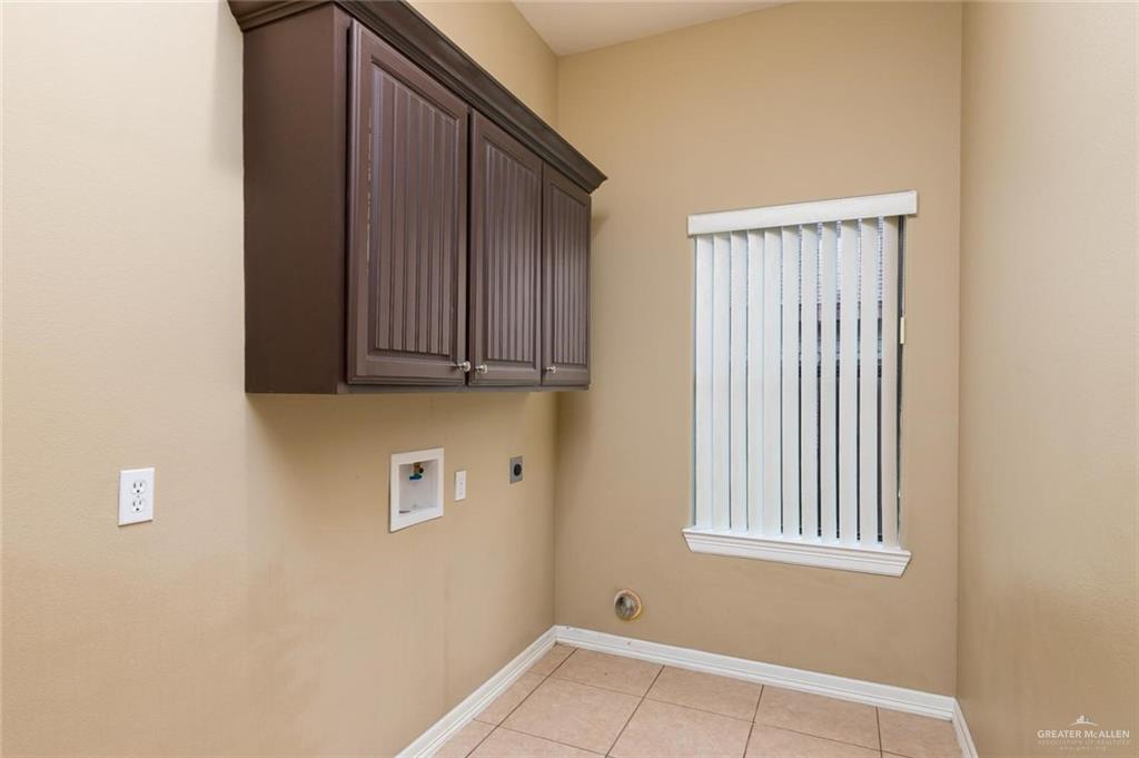 1910 West 41st Street Mission, TX 78573 - Photo 7 of 15 a view of an entryway with wooden floor