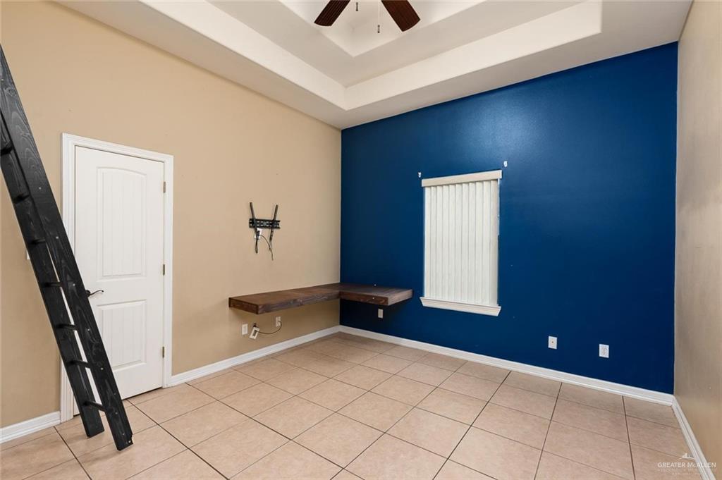 1910 West 41st Street Mission, TX 78573 - Photo 9 of 15 a view of an empty room and window
