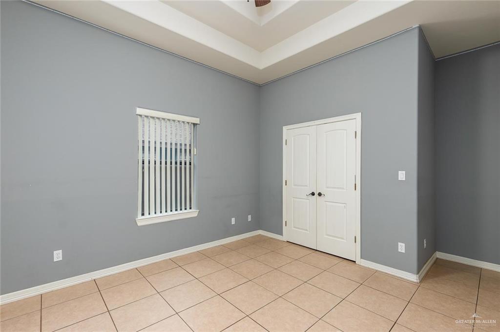 1910 West 41st Street Mission, TX 78573 - Photo 10 of 15 a view of an empty room with window