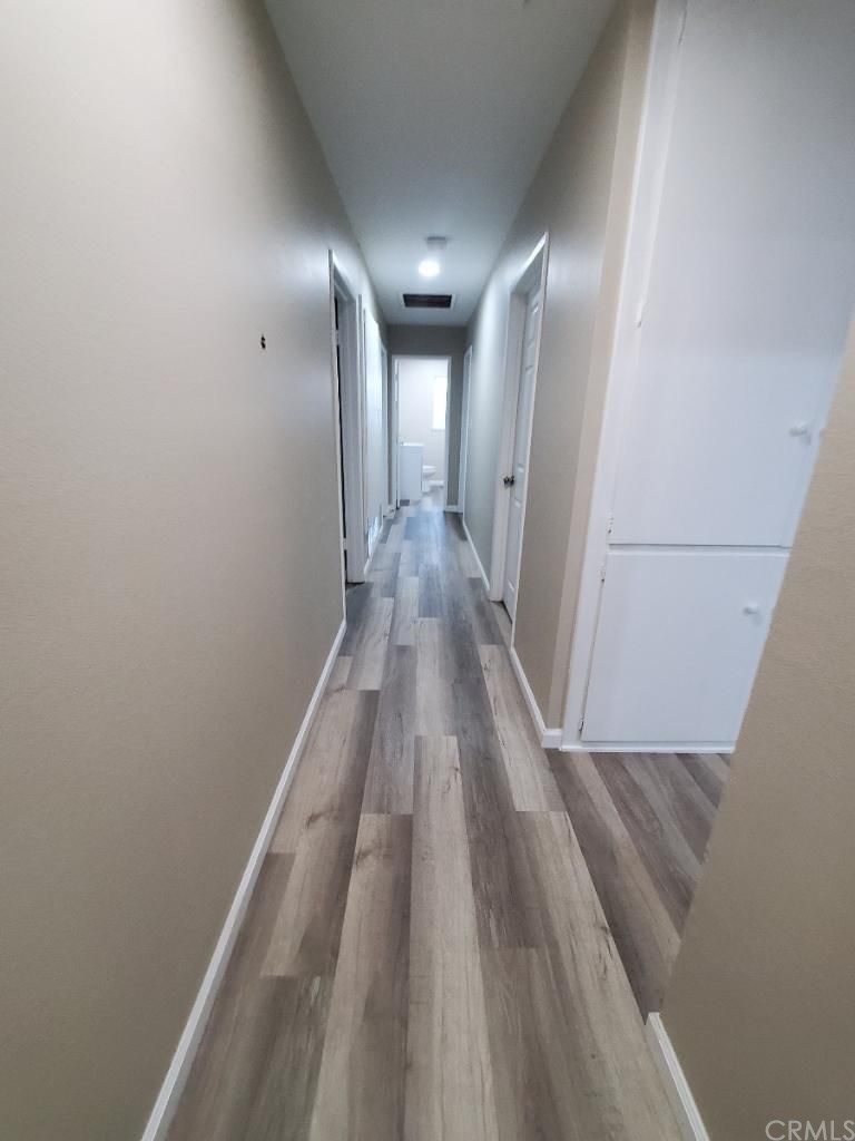 910 West Ave J8 Lancaster, CA 93534 - Photo 12 of 24 a view of gallery with wooden floor