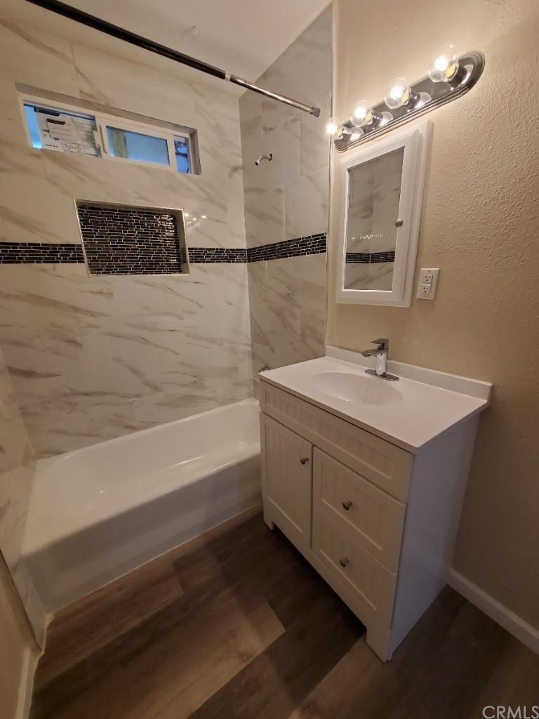 910 West Ave J8 Lancaster, CA 93534 - Photo 18 of 24 a bathroom with a sink double vanity and shower