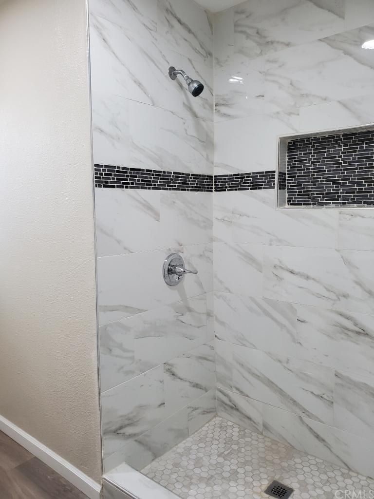 910 West Ave J8 Lancaster, CA 93534 - Photo 23 of 24 a bathroom with a shower
