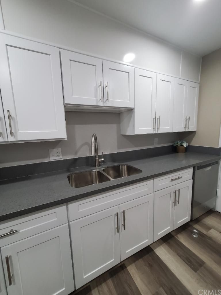 910 West Ave J8 Lancaster, CA 93534 - Photo 9 of 24 a kitchen with appliances cabinets and a sink