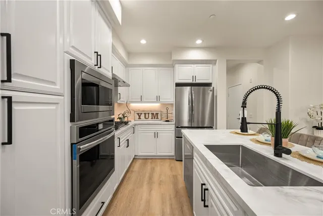 a bathroom with a sink and a shower