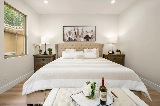 a spacious bathroom with a double vanity sink and a mirror