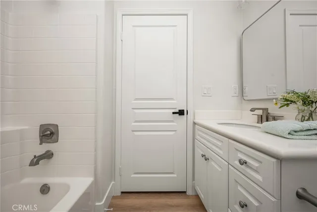 a view of storage and utility room with washer and dryer