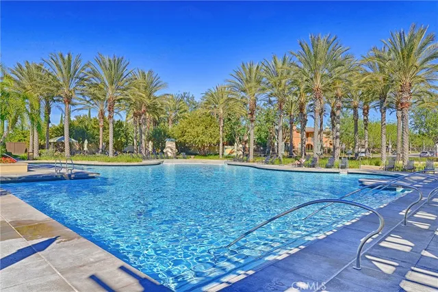 a view of backyard with sitting area
