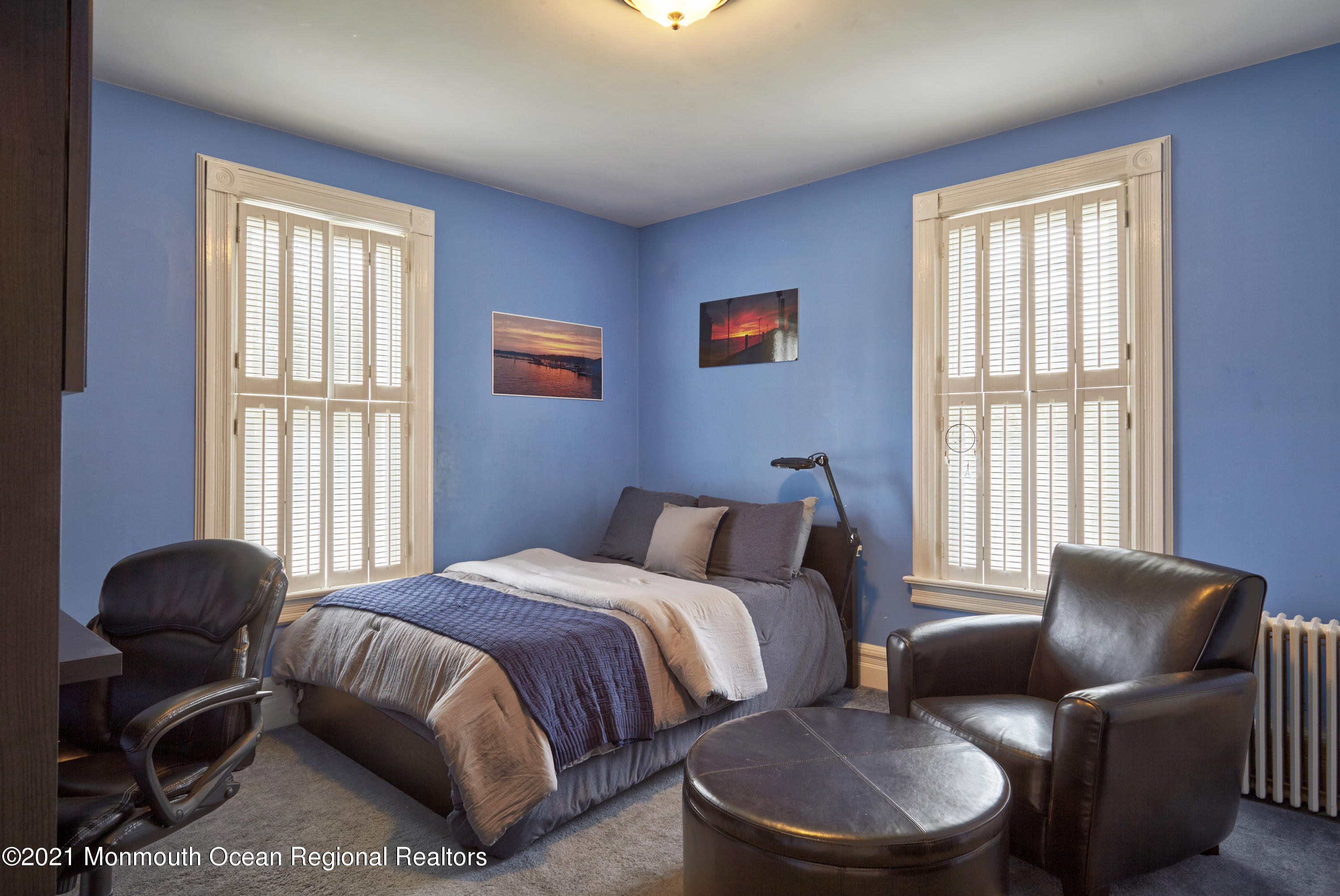 36 Little Silver Point Road Little Silver, NJ 07739 - Photo 22 of 44 a bedroom with a bed and glass window