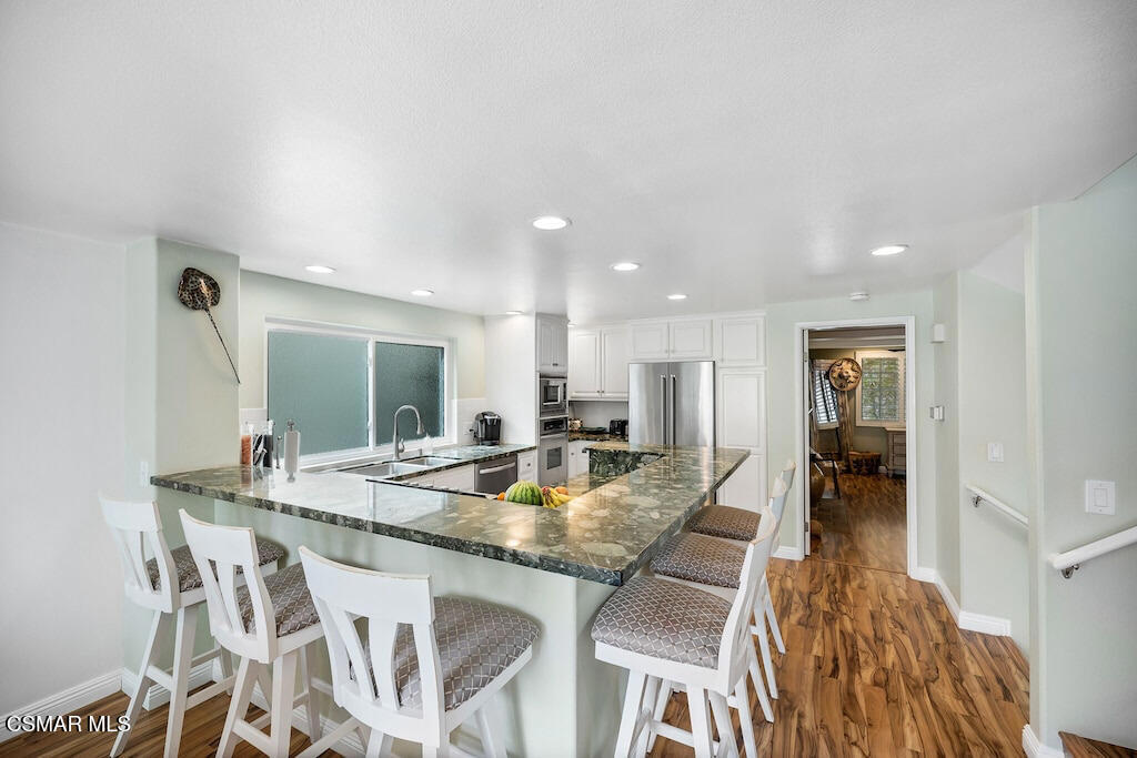 3237 Playa Court Oxnard, CA 93035 - Photo 16 of 48 a view of a dining room with furniture