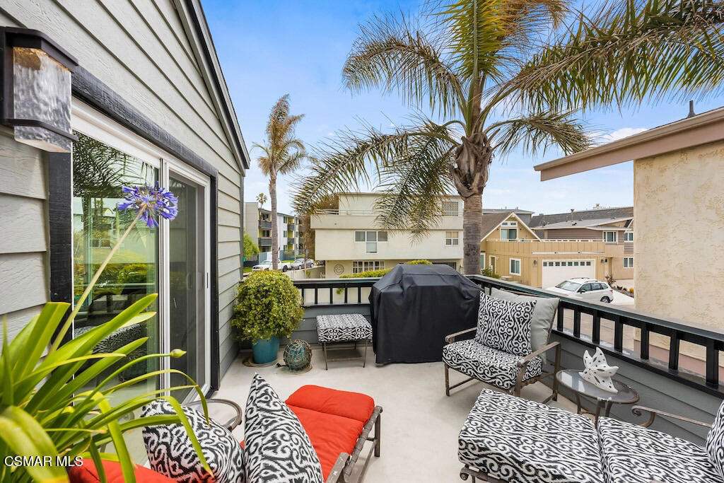 3237 Playa Court Oxnard, CA 93035 - Photo 19 of 48 a backyard of a house with barbeque oven table and chairs