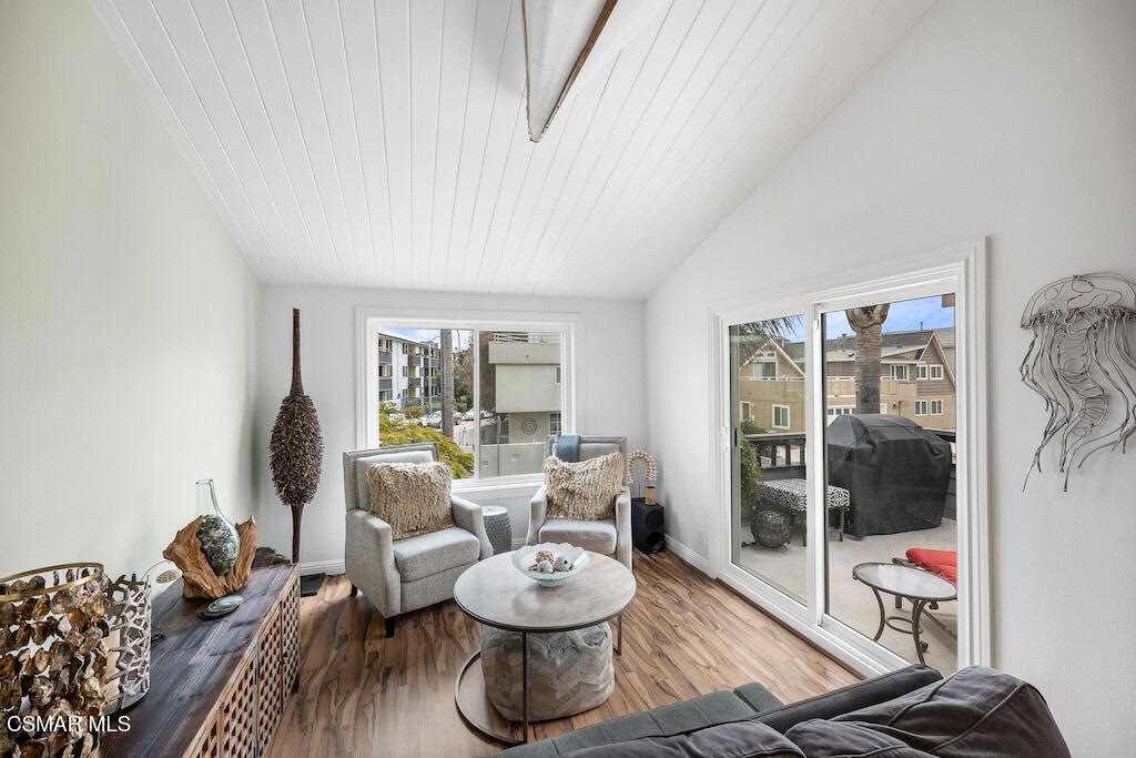 3237 Playa Court Oxnard, CA 93035 - Photo 23 of 48 a living room with furniture and a flat screen tv
