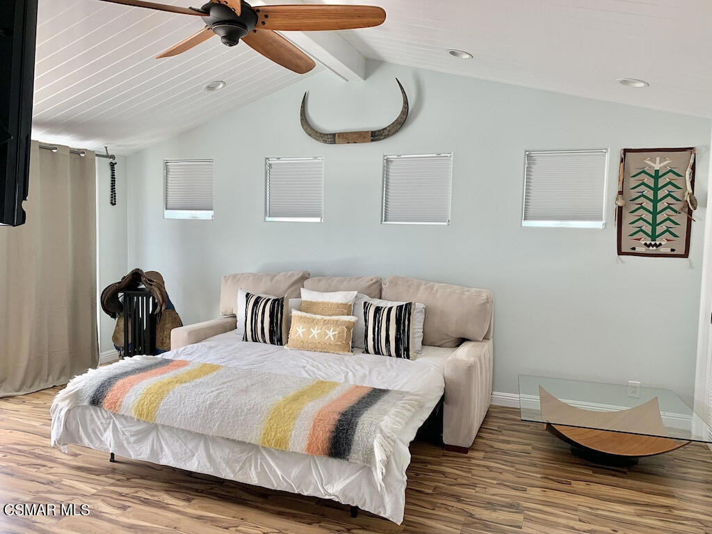 3237 Playa Court Oxnard, CA 93035 - Photo 30 of 48 a bed room with a bed and a chandelier