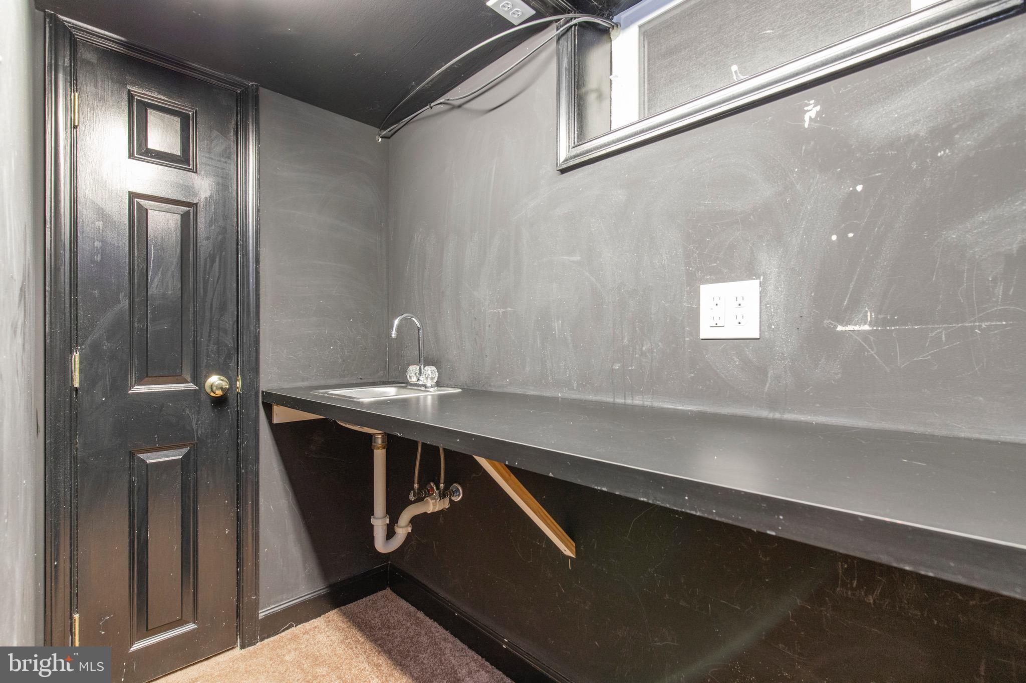 832 Hood Road Swarthmore, PA 19081 - Photo 23 of 28 Basement Storage area w/sink