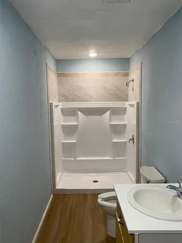 a bathroom with a sink and a toilet