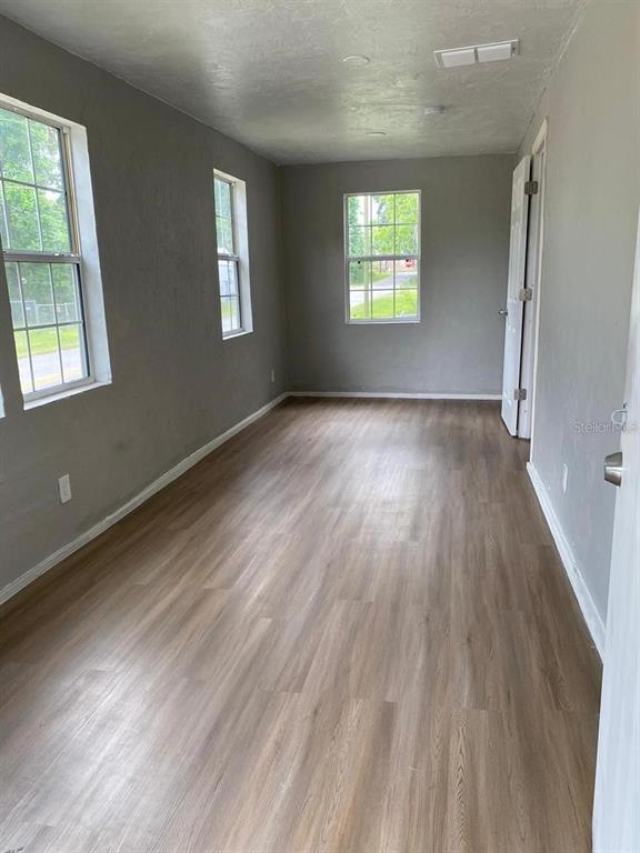 504 Southwest Fort King Street Ocala, FL 34471 - Photo 5 of 13 a view of an empty room and window