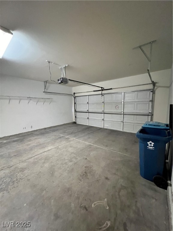 2152 Quarry Ridge Street, Unit 103 Las Vegas, NV 89117 - Photo 11 of 43 Garage featuring a garage door opener
