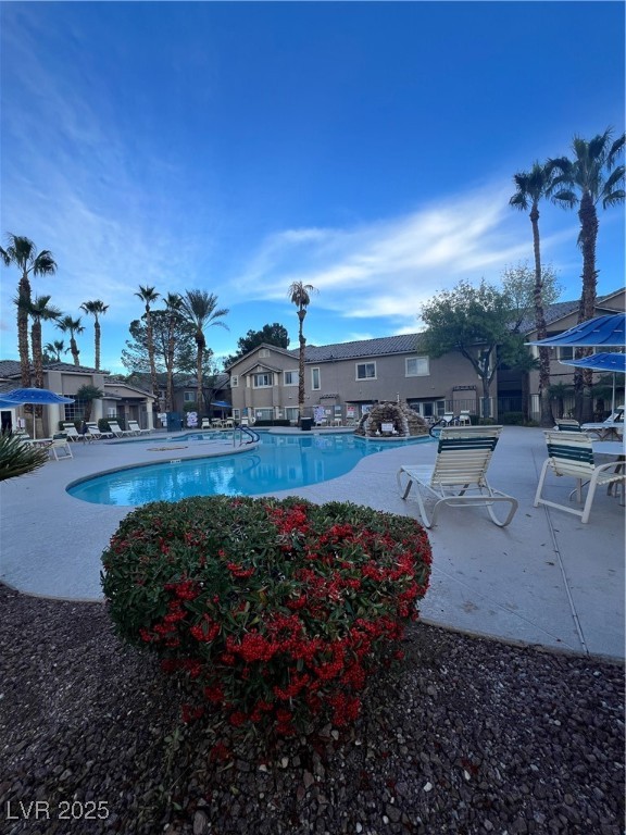 2152 Quarry Ridge Street, Unit 103 Las Vegas, NV 89117 - Photo 35 of 43 Community pool featuring a patio