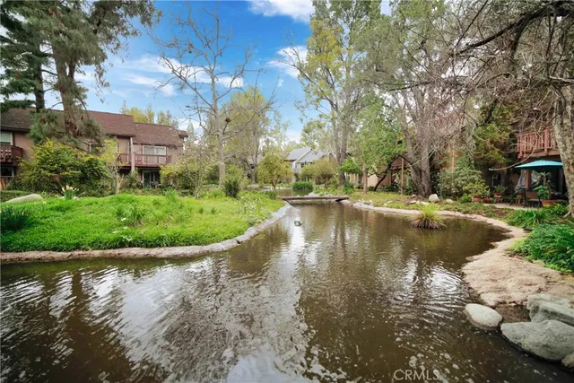 a view of a lake with houses